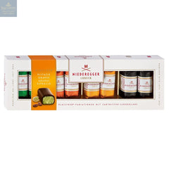 Dark chocolate covered mini marzipan loaves in gift box - pistachio, orange, pineapple, espresso