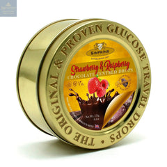 Gold embossed tin of chocolate centred strawberry & raspberry travel sweets
