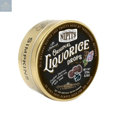Gold tin of original liquorice flavour Nipit travel sweets