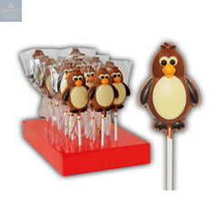 Hand decorated chocolate penguin lollipops in display
