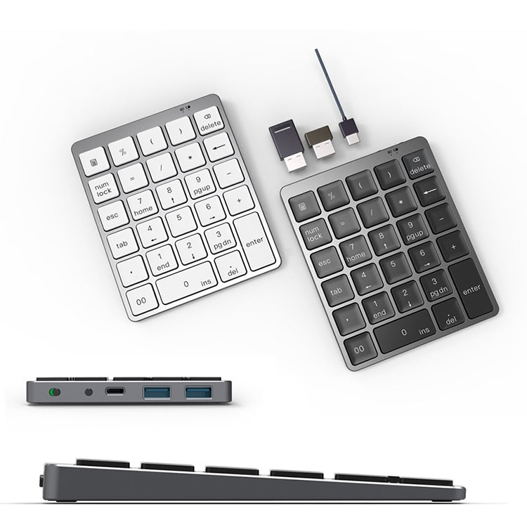 N970 Pro Dual Modes Aluminum Alloy Rechargeable Wireless Bluetooth Numeric Keyboard with USB HUB N970 Pro Dual Modes Aluminum Alloy Rechargeable Wireless Bluetooth Numeric Keyboard with USB HUB
