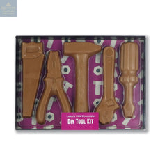 Milk chocolate DIY tool kit in black gift box with clear lid
