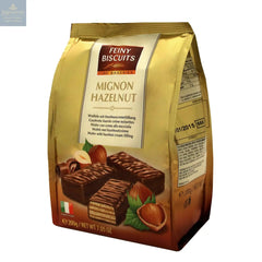 Milk chocolate covered mignon wafers with hazelnut cream filling in sachet bag