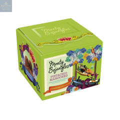 Pistachio Marooned gift box of pistachio flavoured cocoa dusted truffles with macaron drops