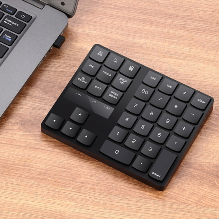 2.4G USB Wireless Numeric Keypad 35 Keys Charging Digital Keyboard Notebook Laptop Mini Numpad 2.4G USB Wireless Numeric Keypad 35 Keys Charging Digital Keyboard Notebook Laptop Mini Numpad
