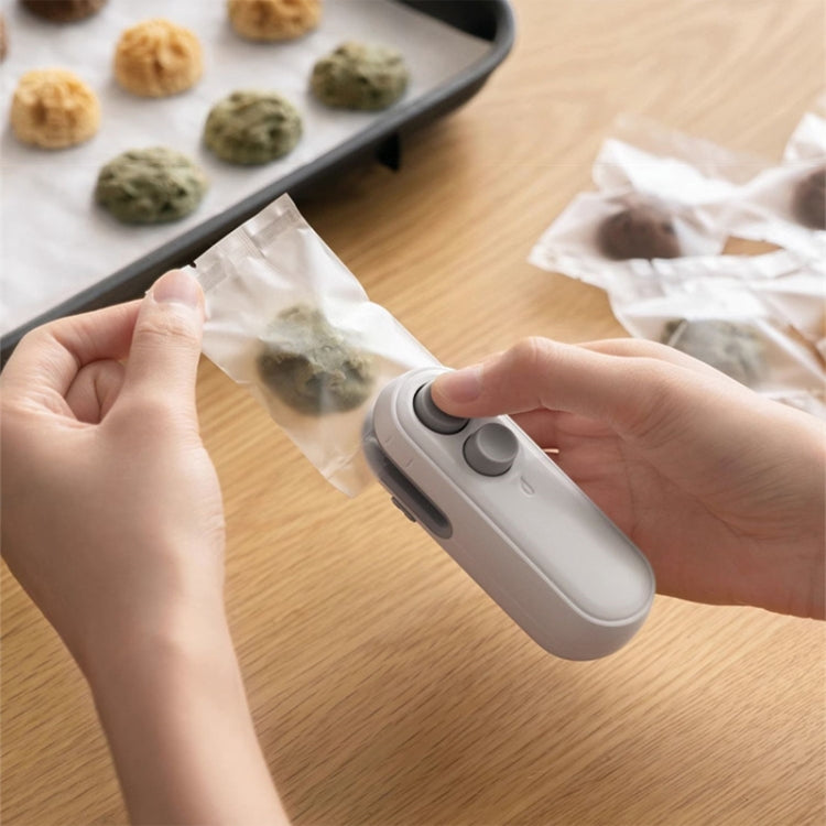 Small 2-in-1 Rechargeable Magnetic Snack Sealer Household Mini Sealing Machine Small 2-in-1 Rechargeable Magnetic Snack Sealer Household Mini Sealing Machine