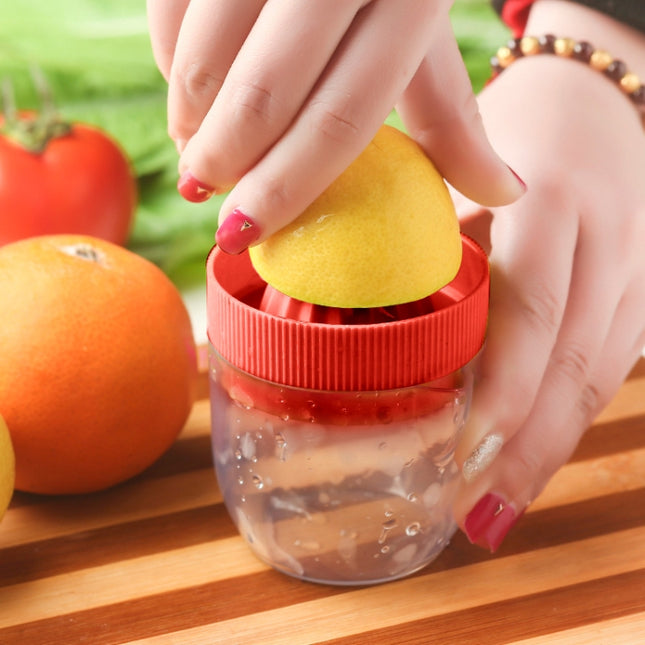 Multi-function Manual Mini Lemon Juicer with a Graduation Cup Juicer