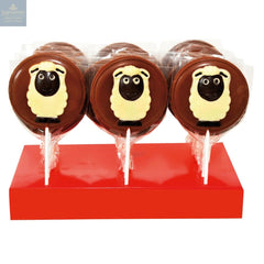 Hand decorated milk chocolate sheep lollipops in display
