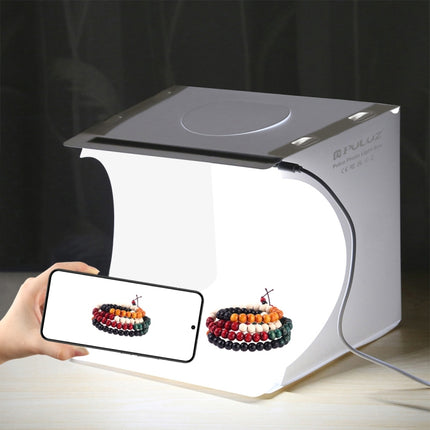 PULUZ 20 cm zusammenklappbares tragbares 550 lm-Fotobeleuchtungs-Studio-Shooting-Zelt-Box-Set mit 6 Farbhintergründen (Schwarz, Weiß, Orange, Rot, Grün, Blau), Größe ausgeklappt: 24 cm x 23 cm x 23 cm, 20 cm Box, 20 cm Box (USA), 20 cm Box (VAE-Lager)