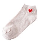 Beige body red heart