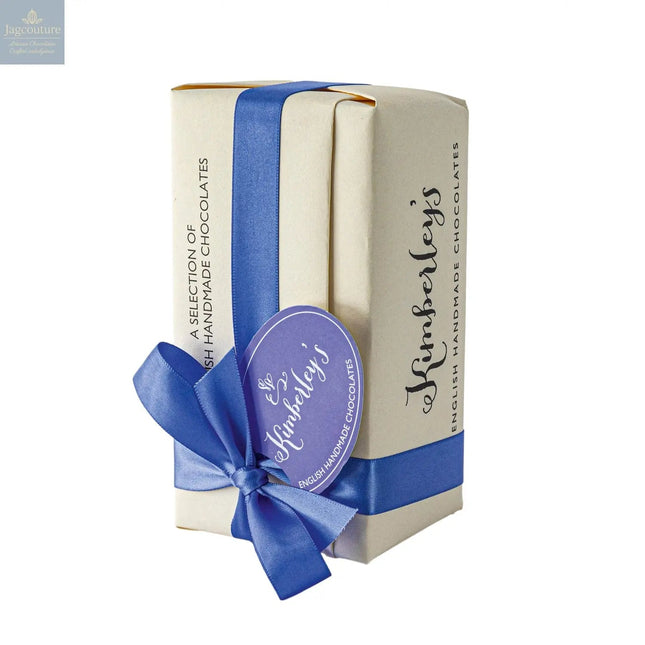 Wrapped ballotin of assorted handmade English chocolates with menu tag